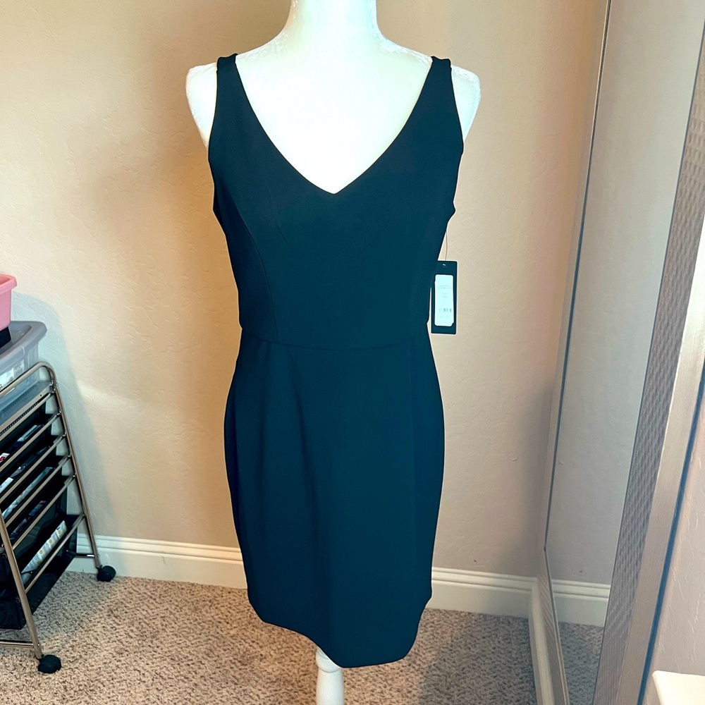 Black Bebe mini dress with gold zipper